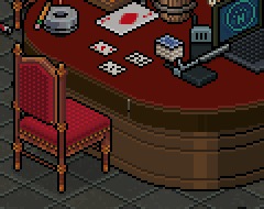 A card table with a hand dealt face-up and a chair pulled out
