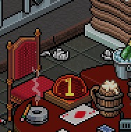 The dice table in the clubhouse — a throne, a rug and a single die